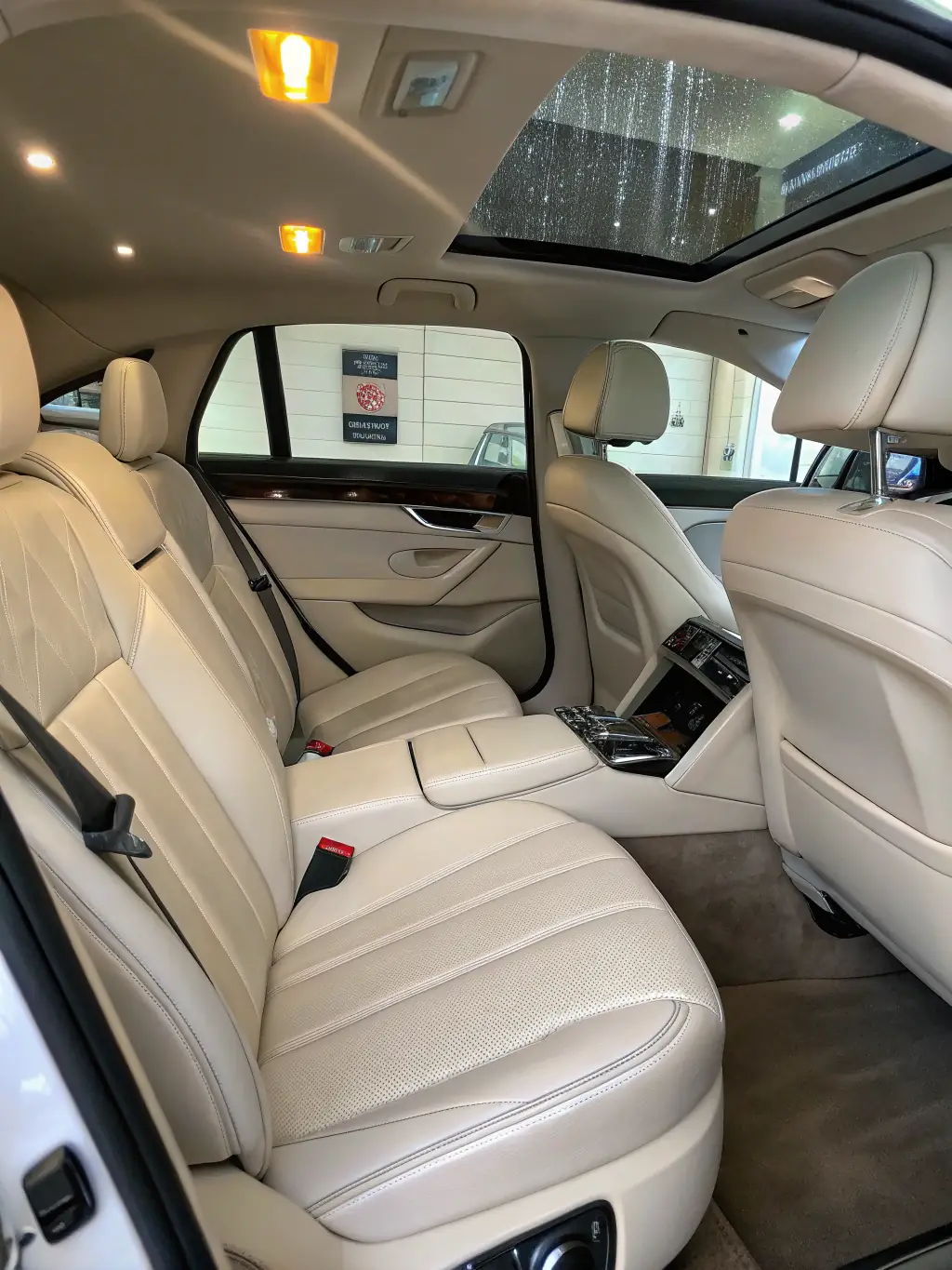 The interior of a car with spotless seats and surfaces after a vehicle steam cleaning session, demonstrating the thoroughness of the service.